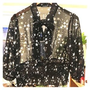 Sheer tie front printed top star pattern